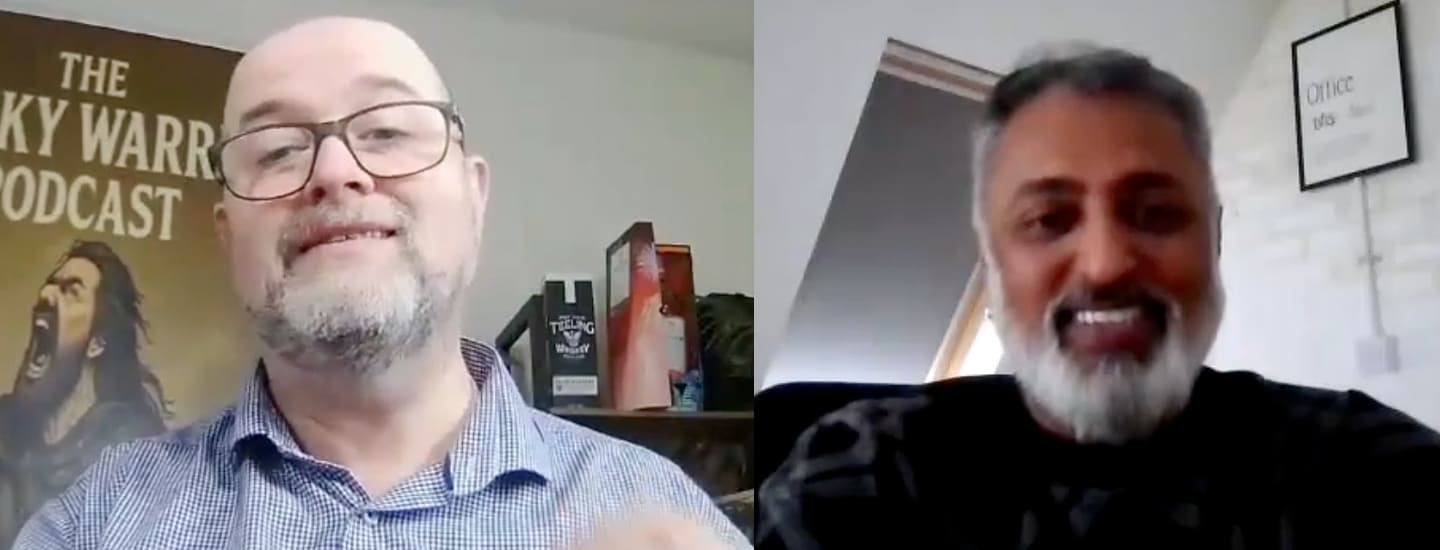 Two people engaged in a virtual video podcast interview, shown side-by-side on a split-screen video call setup.