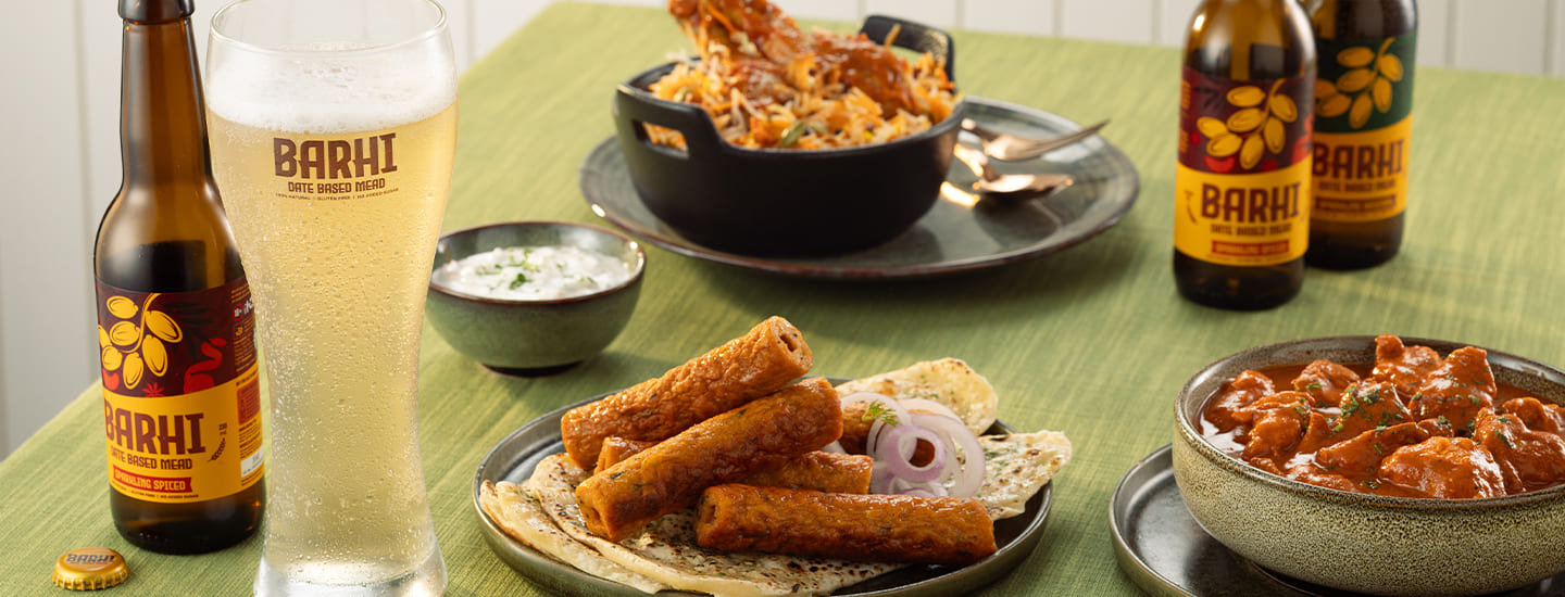 BARHI Fresh Date Spritz served with flavour-rich food