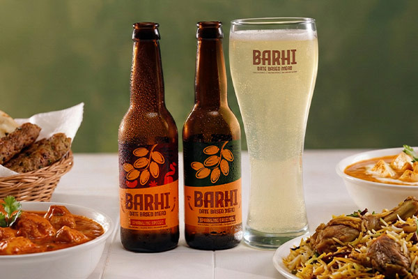 BARHI Fresh Date Spritz served with flavour-rich food