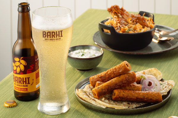 BARHI Fresh Date Spritz served with flavour-rich food